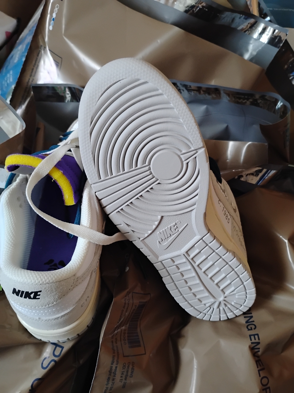 Nike Men’s White Sneakers with Purple and Yellow Accents